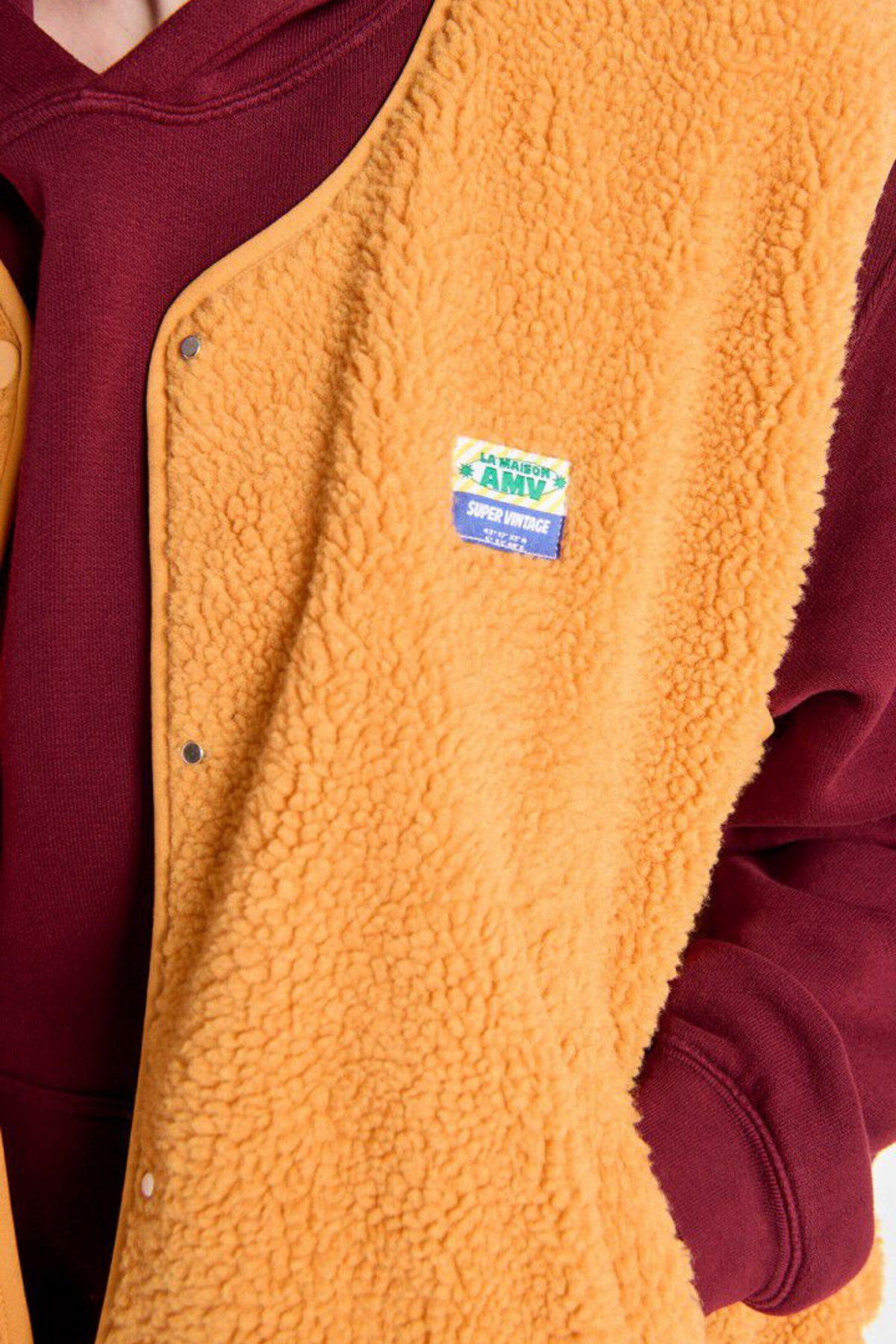 HOKTOWN SLEEVELEES JACKET - NECTARINE
