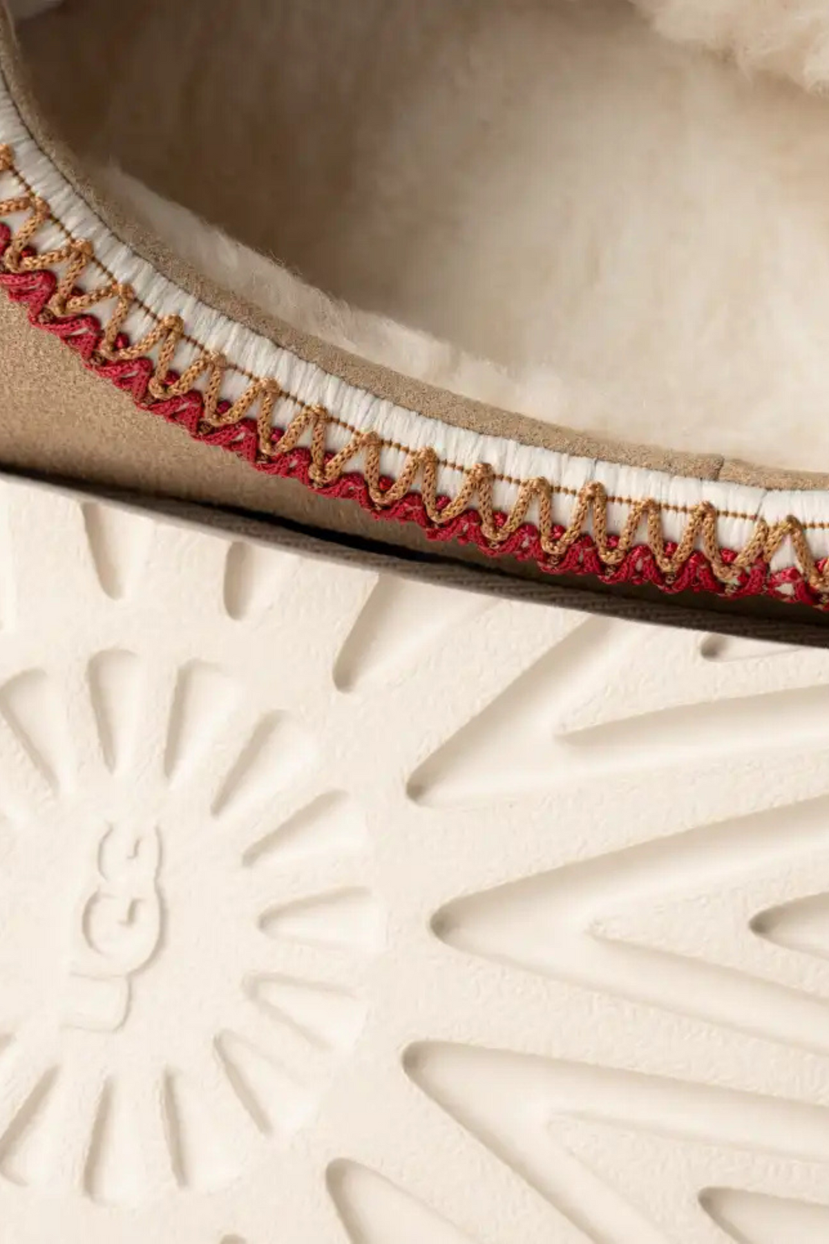 UGG women tasman in sand/dark cherry. Close front view