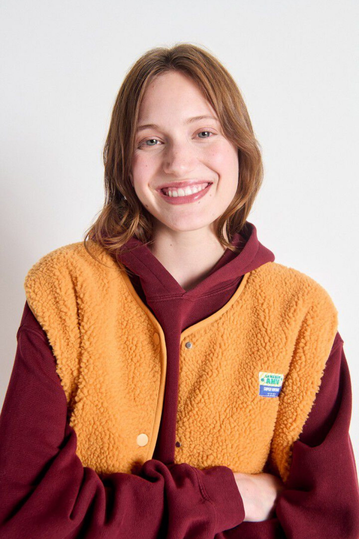 HOKTOWN SLEEVELEES JACKET - NECTARINE
