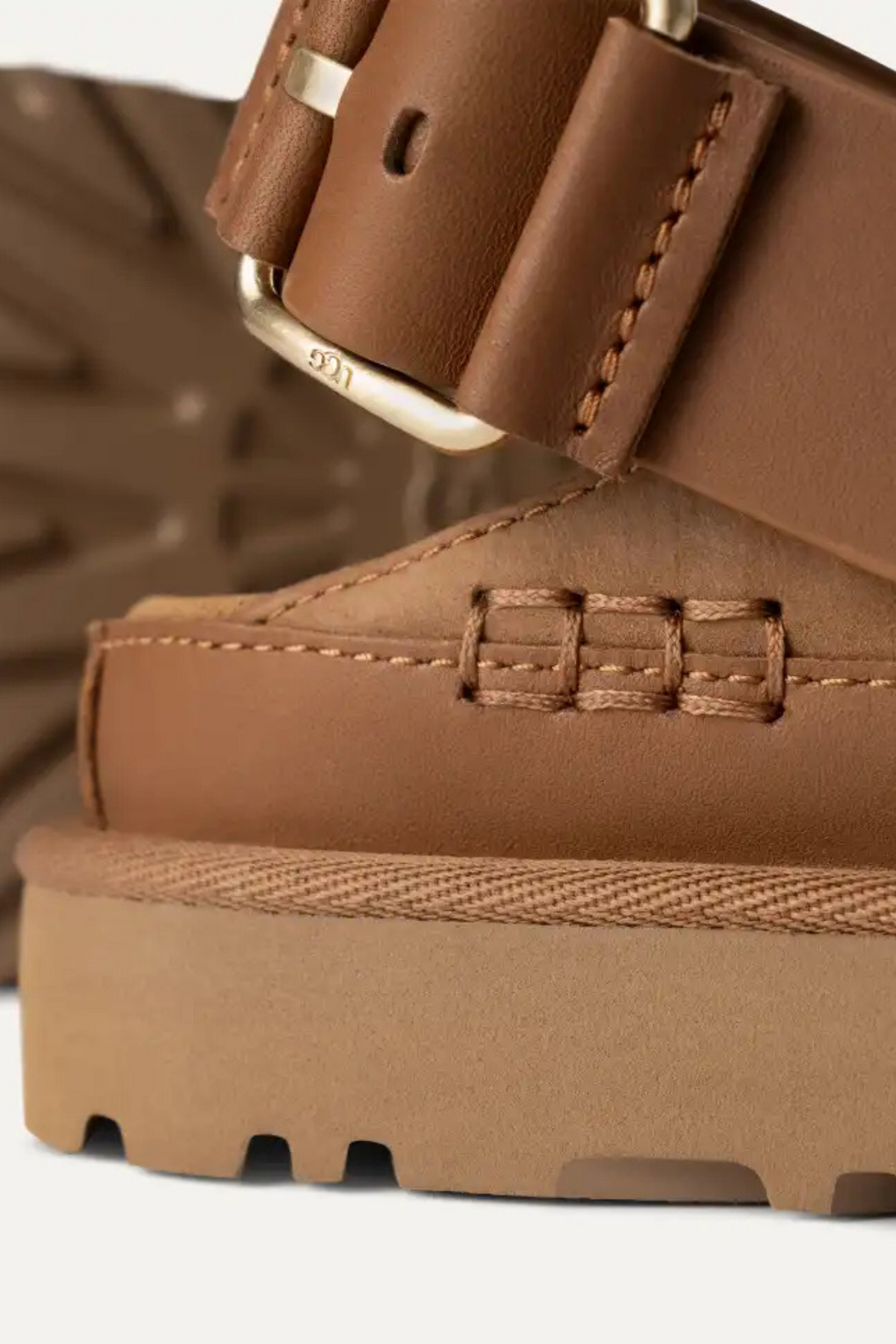 UGG women goldenstar villa clog in chestnut. Close side view